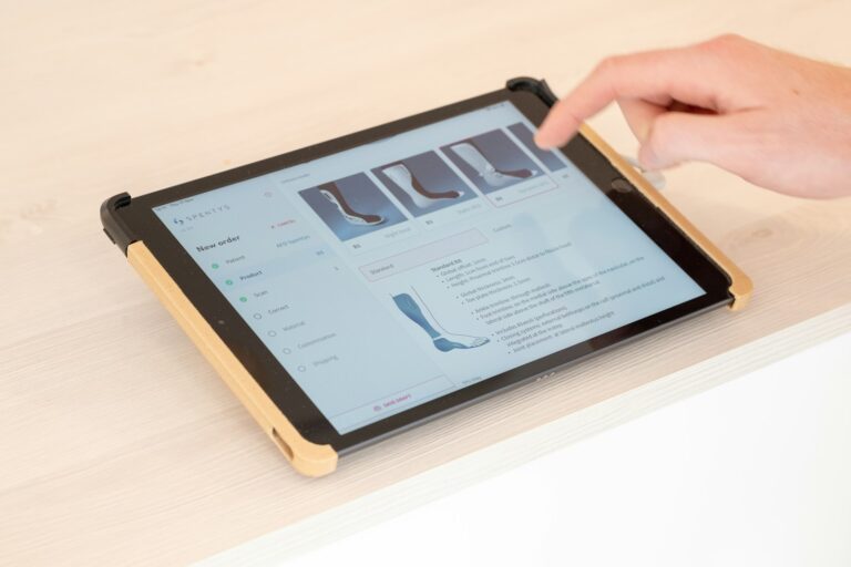Person testing refurbished tablet touch display