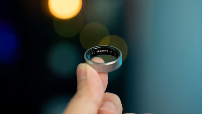 Hand wearing smart ring closeup