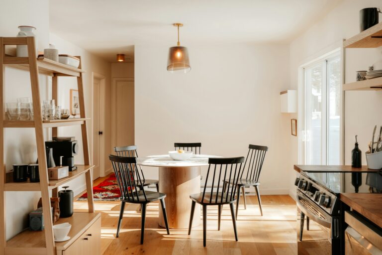 Robot vacuum under dining table chairs
