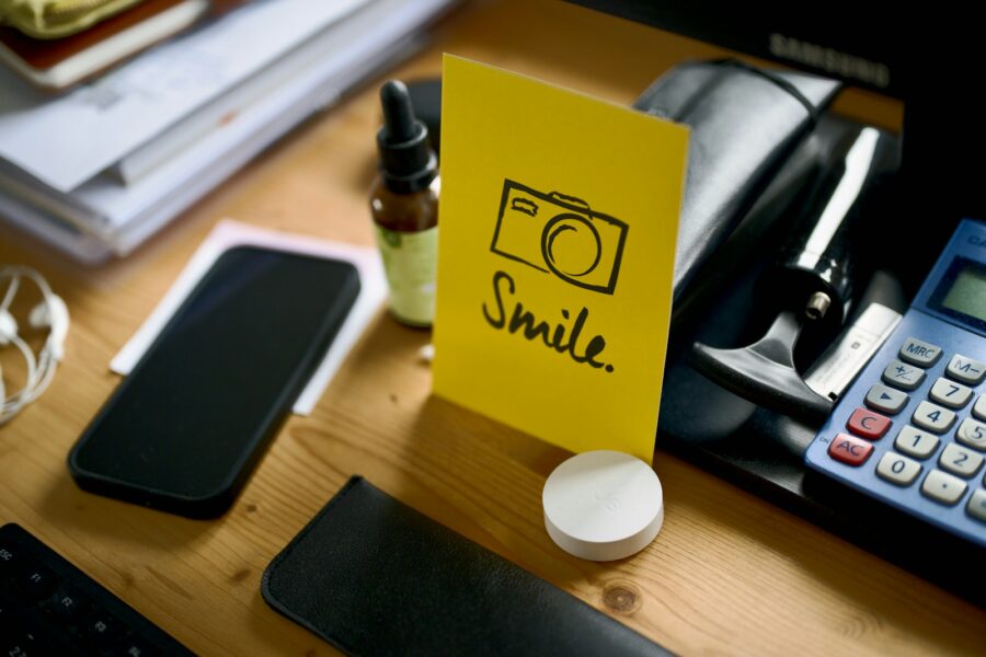 Refurbished smartphone stack wooden desk