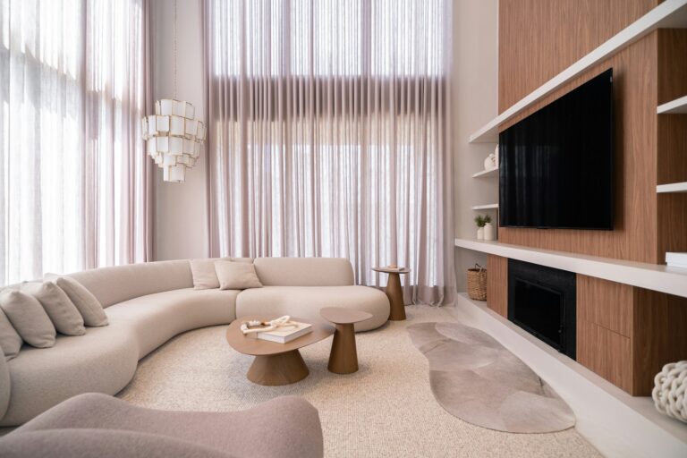 Bookshelf speakers rug curtains living room