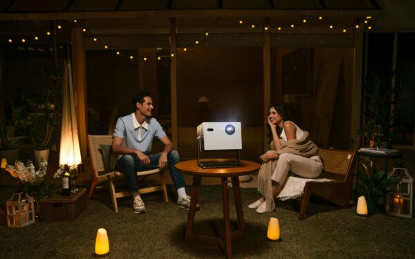 How to set up a backyard movie night with a projector and portable speaker