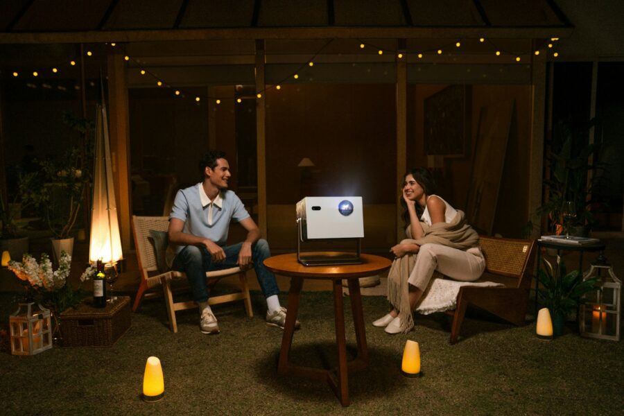 Backyard movie night projector screen chairs