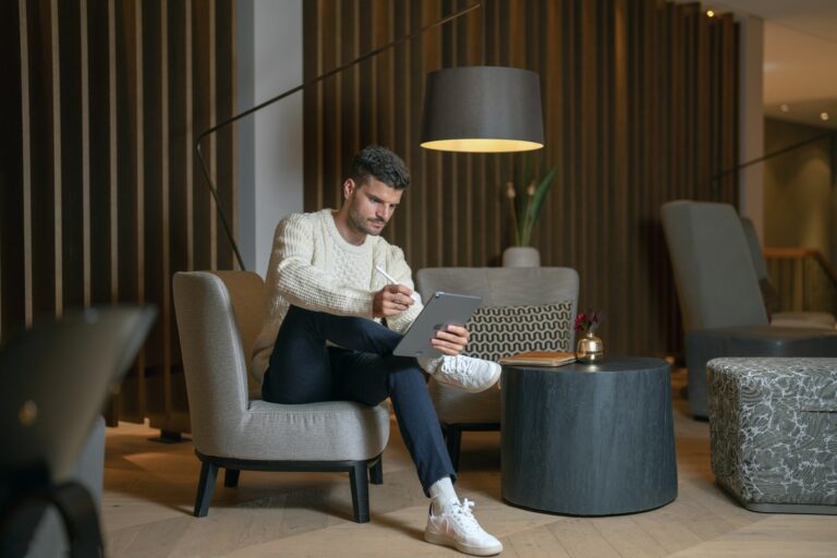 Person plugging streaming stick into hotel