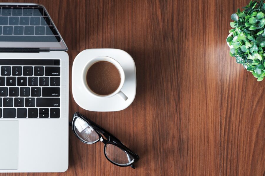 Thin laptop keyboard coffee desk
