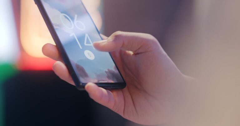 Hand holding smartphone