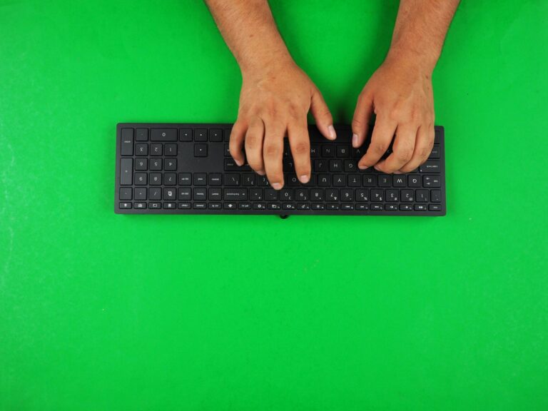 Close hands typing external keyboard