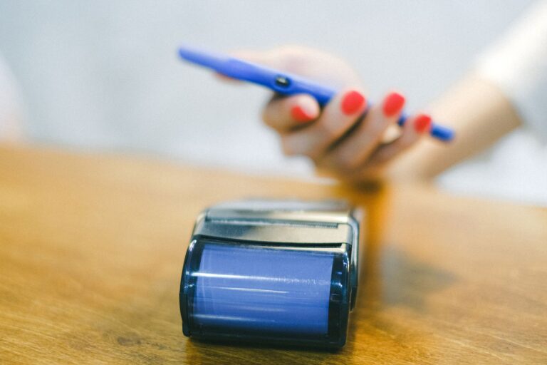 Smart ring closeup finger ceramic nfc payment terminal