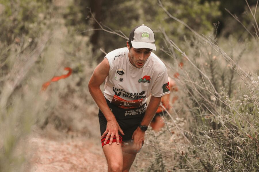 Sports watch runner outdoor trail closeup