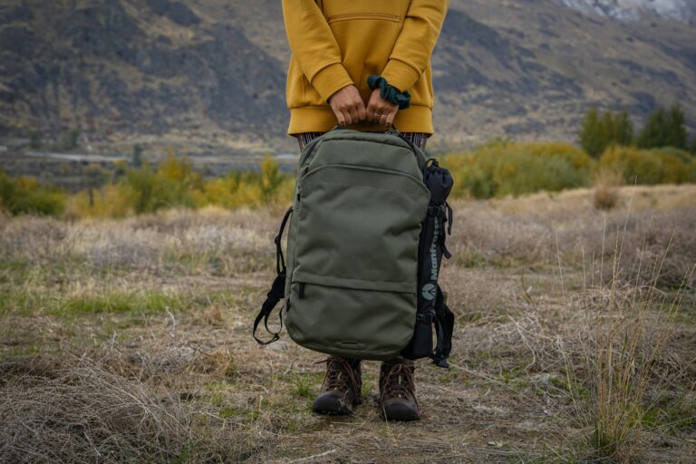 Person carrying slim laptop backpack