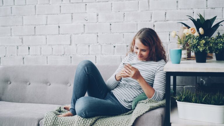 Woman checking smartwatch
