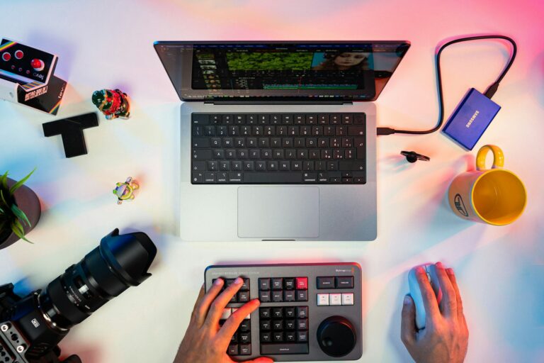 Photographer editing laptop