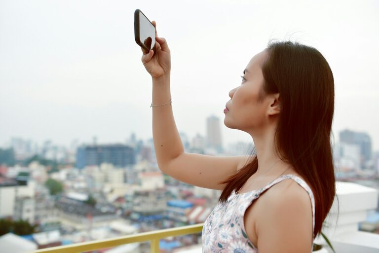 Woman taking portrait