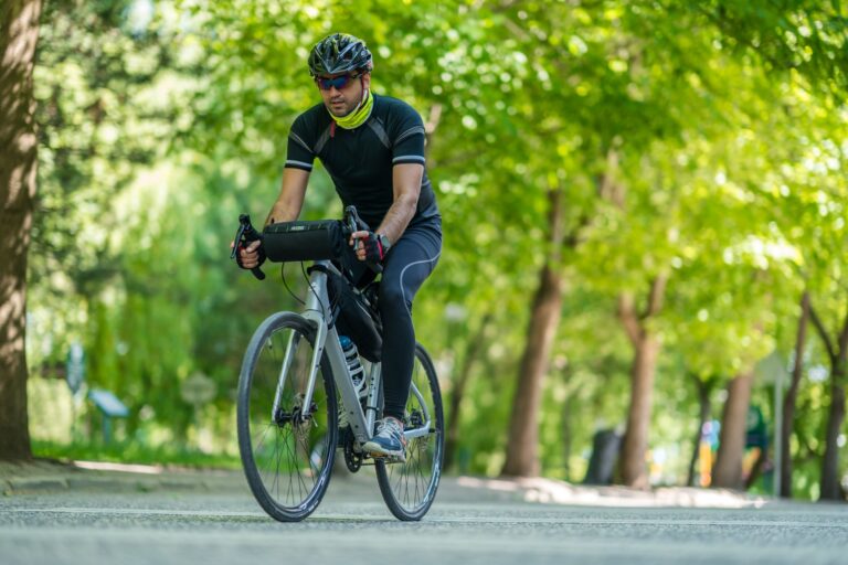 Cyclist wearing smartwatch