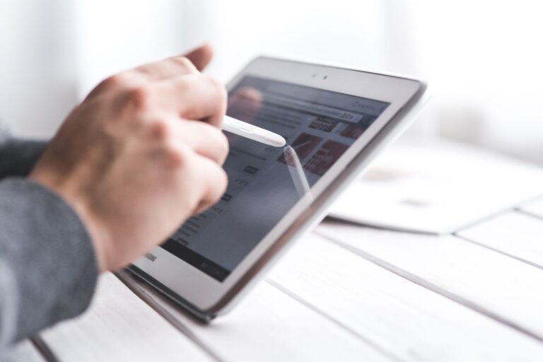 Hand holding stylus