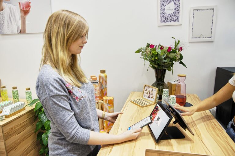 Woman paying smartphone