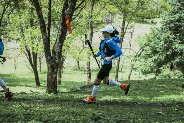 Trail runner checking